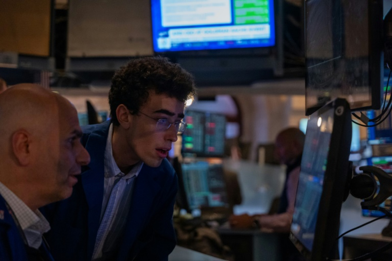 Des opérateurs du New York Stock Exchange © SPENCER PLATT