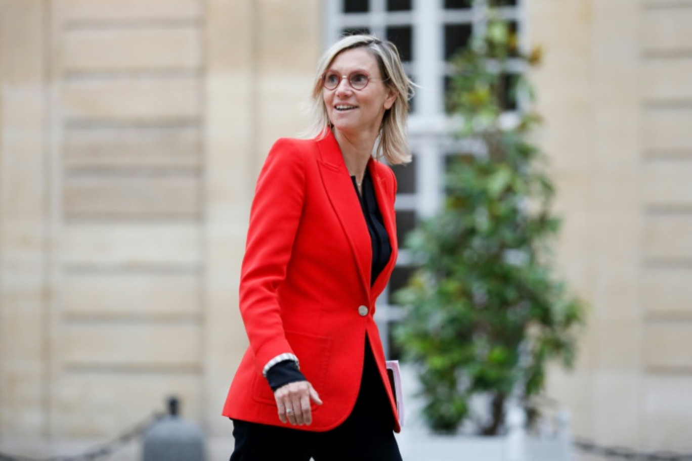 La nouvelle ministre de la Transition écologique, Agnès Pannier-Runacher, arrive à l'hôtel Matignon pour une réunion avec les membres du nouveau cabinet et le Premier ministre Michel Barnier, le 23 septembre 2024 à Paris © IAN LANGSDON