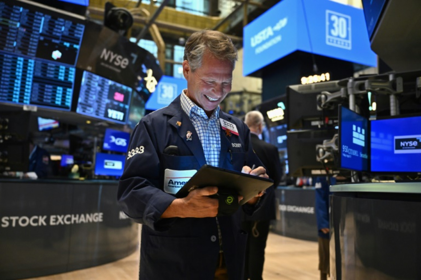 Un opérateur du New York Stock Exchange © ANGELA WEISS