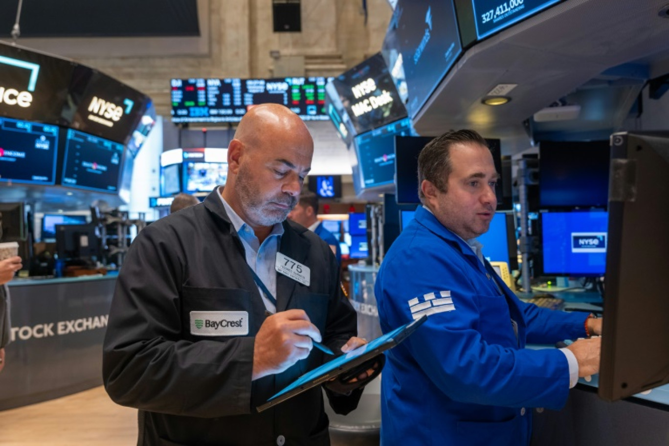 Des opérateurs du New York Stock Exchange © SPENCER PLATT