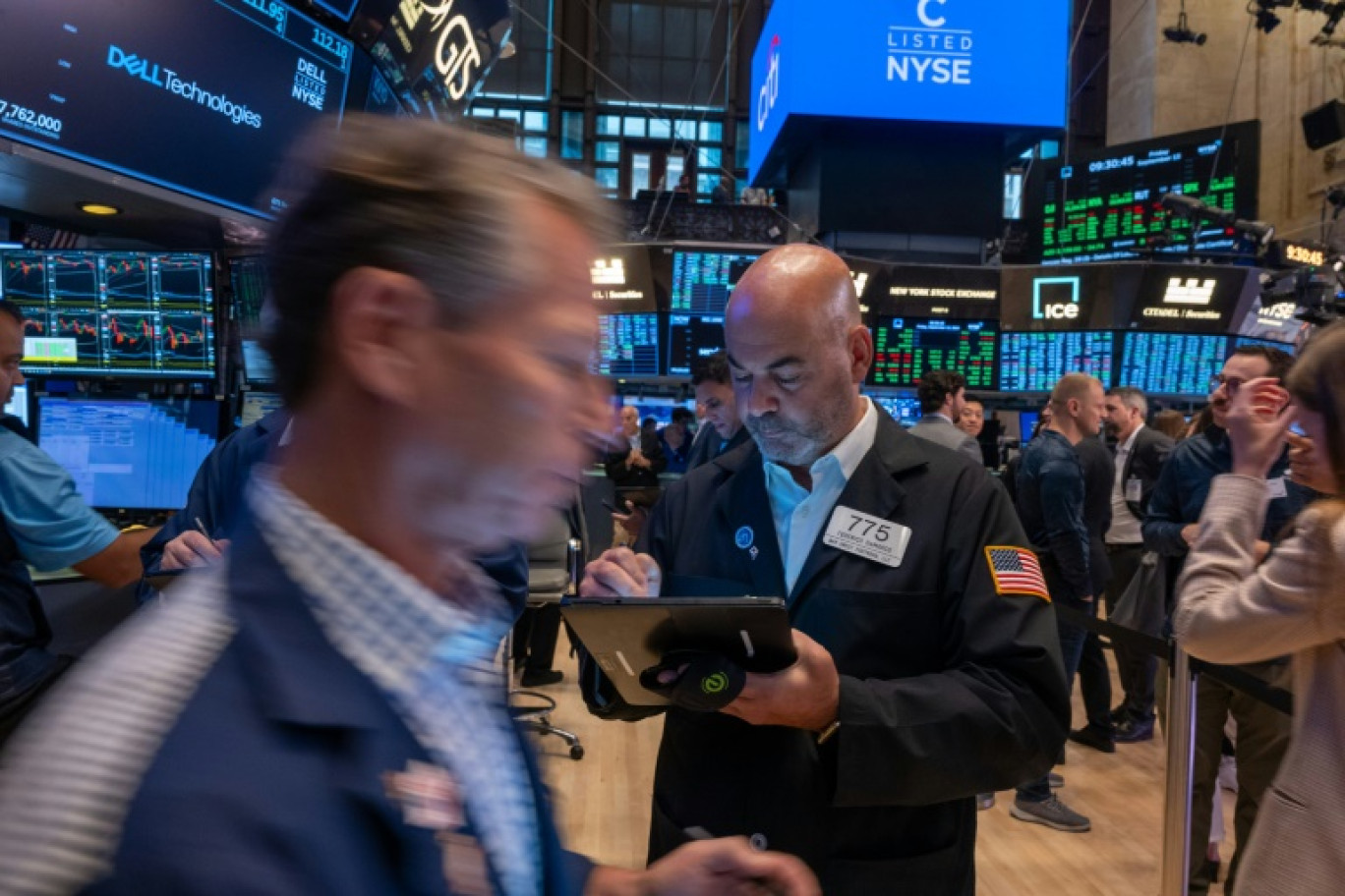 Des opérateurs du New York Stock Exchange © SPENCER PLATT