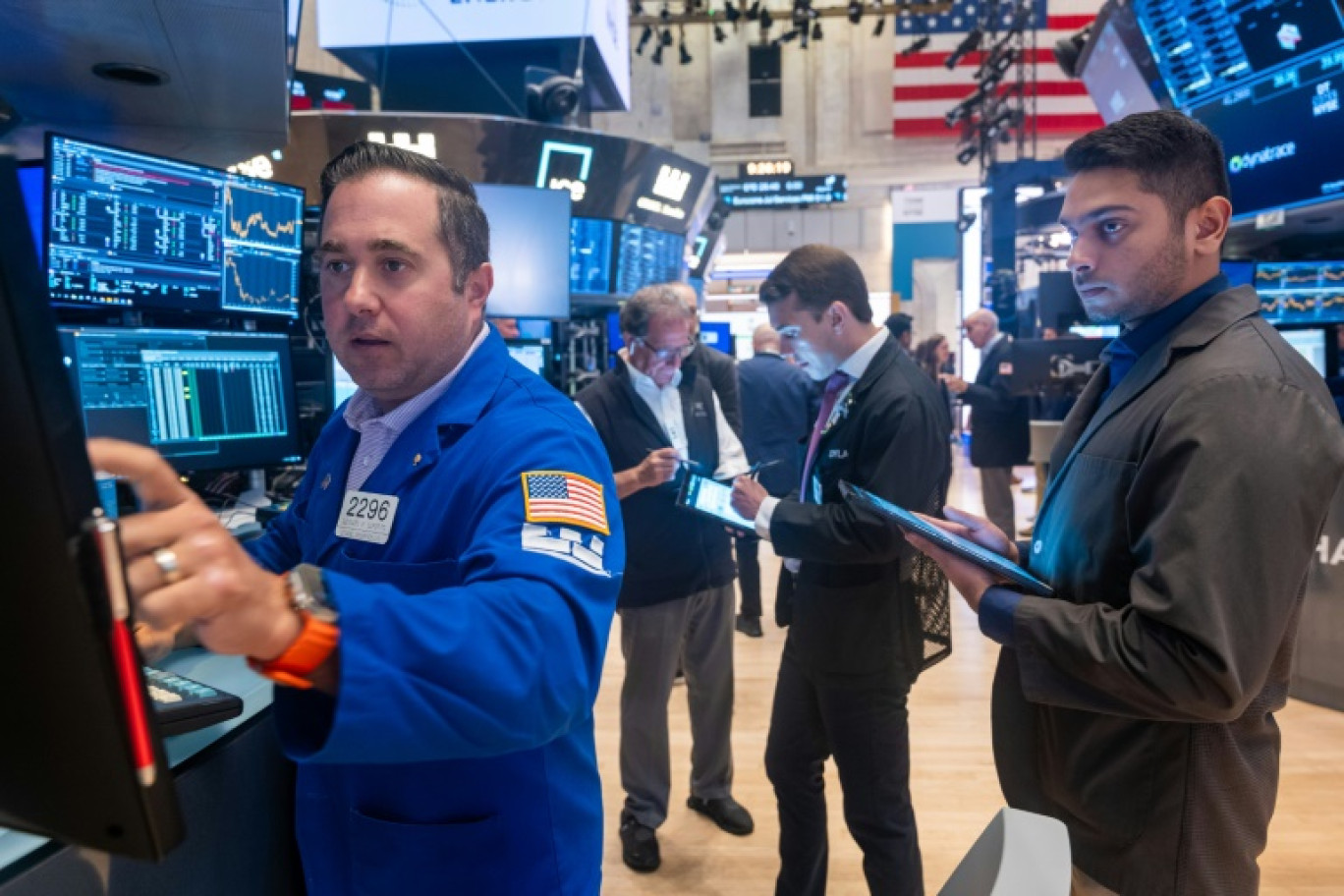 Des opérateurs du New York Stock Exchange © SPENCER PLATT