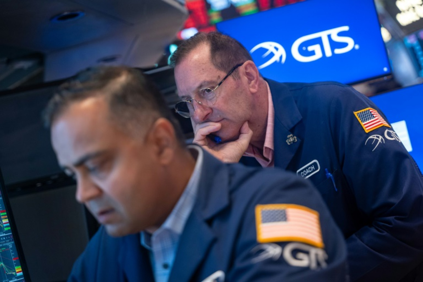 Des opérateurs du New York Stock Exchange © SPENCER PLATT