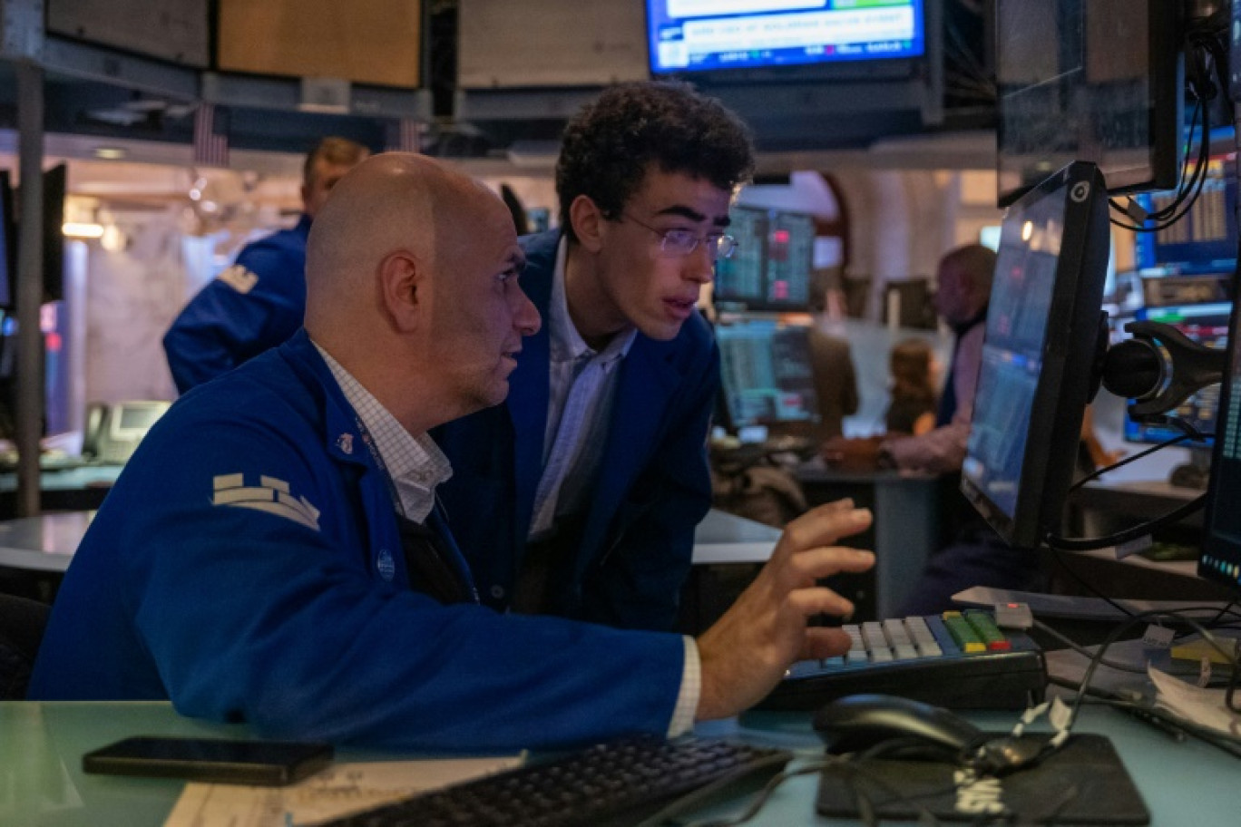 Des opérateurs du New York Stock Exchange © SPENCER PLATT