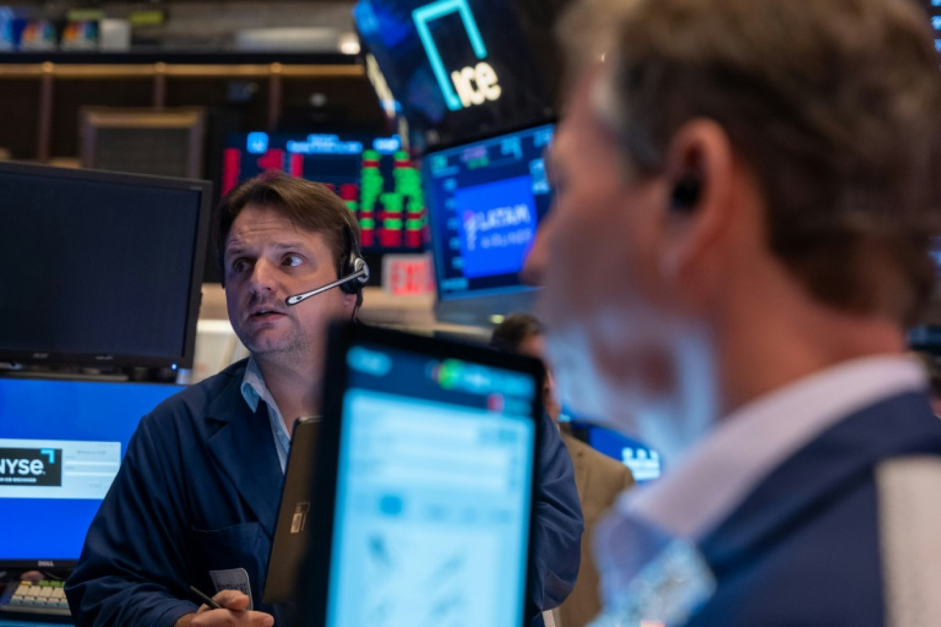 Des opérateurs du New York Stock Exchange © SPENCER PLATT