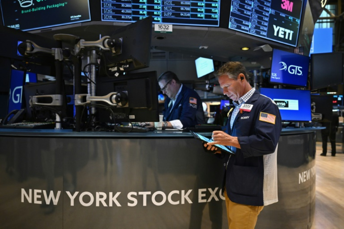 Des opérateurs du New York Stock Exchange © ANGELA WEISS