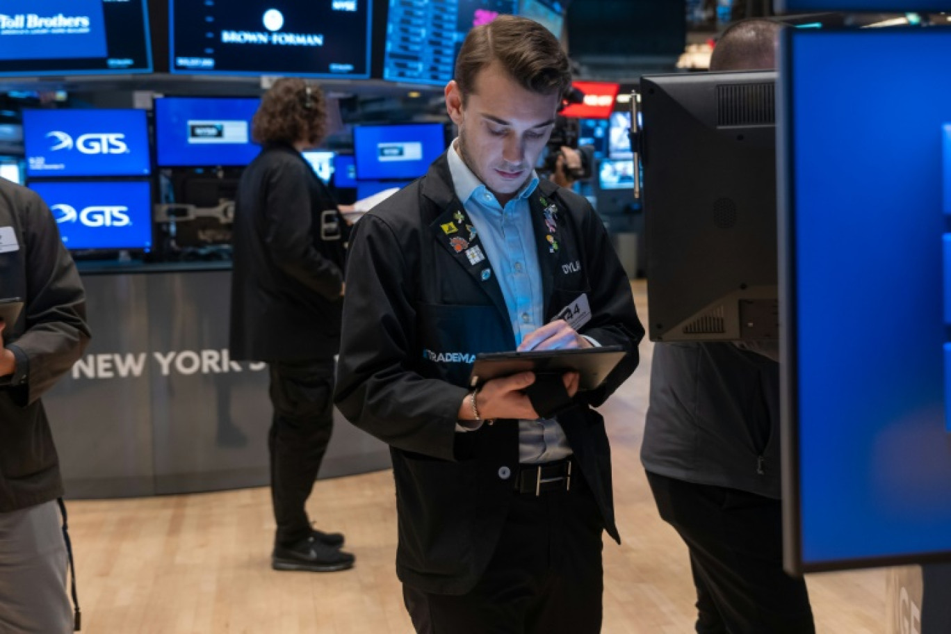 Un opérateur du New York Stock Exchange © SPENCER PLATT