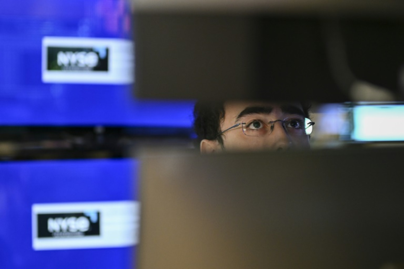 Un opérateur du New York Stock Exchange © ANGELA WEISS