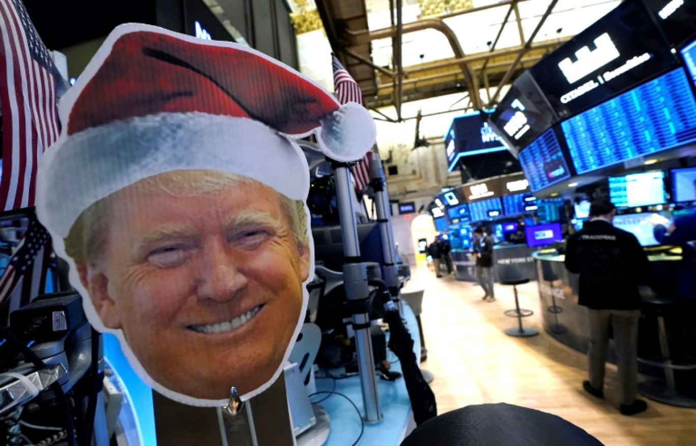 Le visage de Donald Trump imprimé dans les locaux de la Bourse de New York le 26 novembre 2024 © TIMOTHY A. CLARY