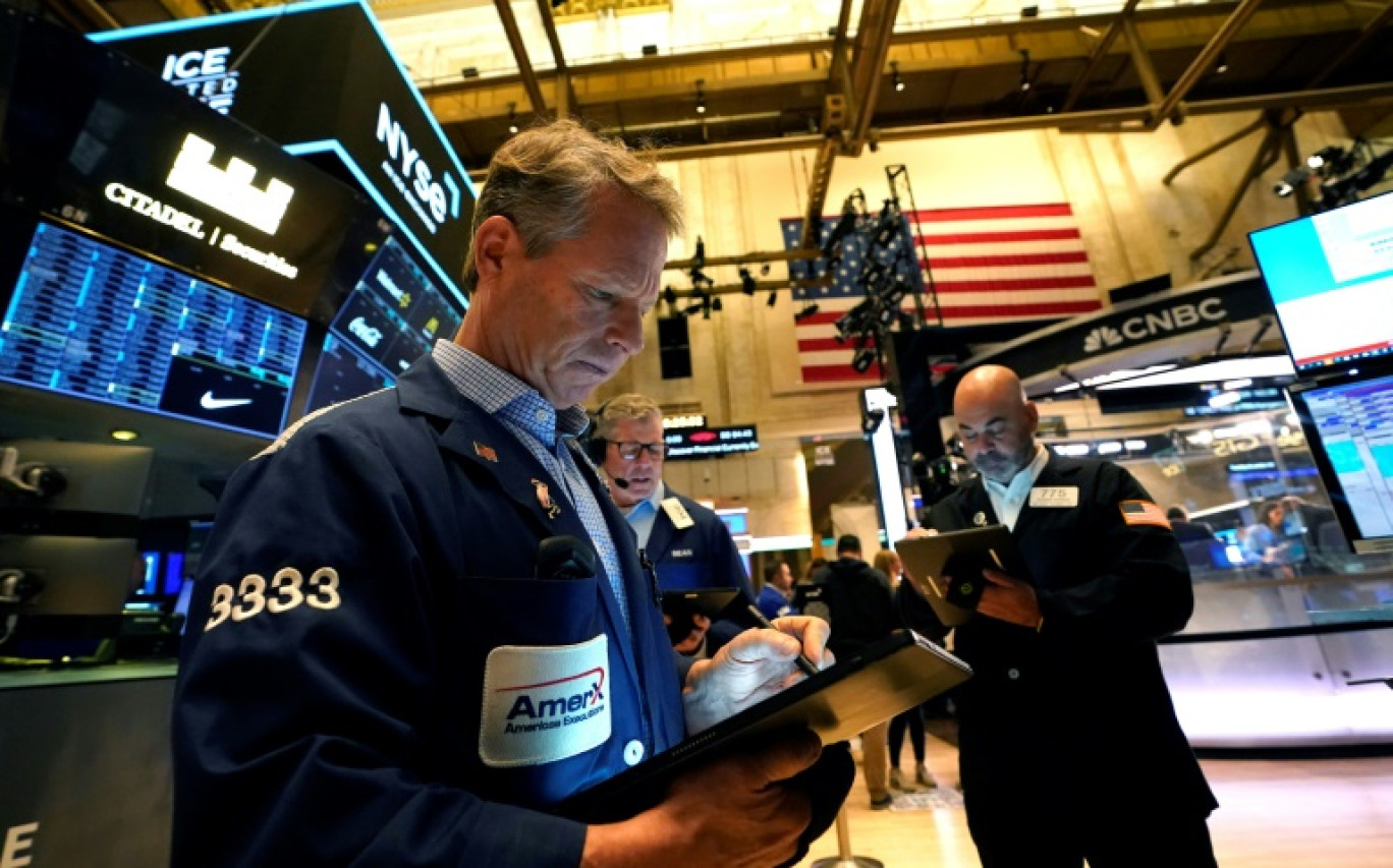 Des opérateurs du New York Stock Exchange © TIMOTHY A. CLARY