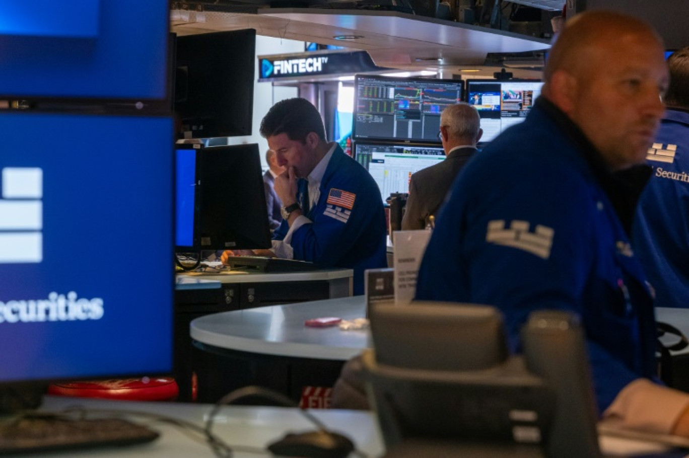 Des opérateurs du New York Stock Exchange © SPENCER PLATT