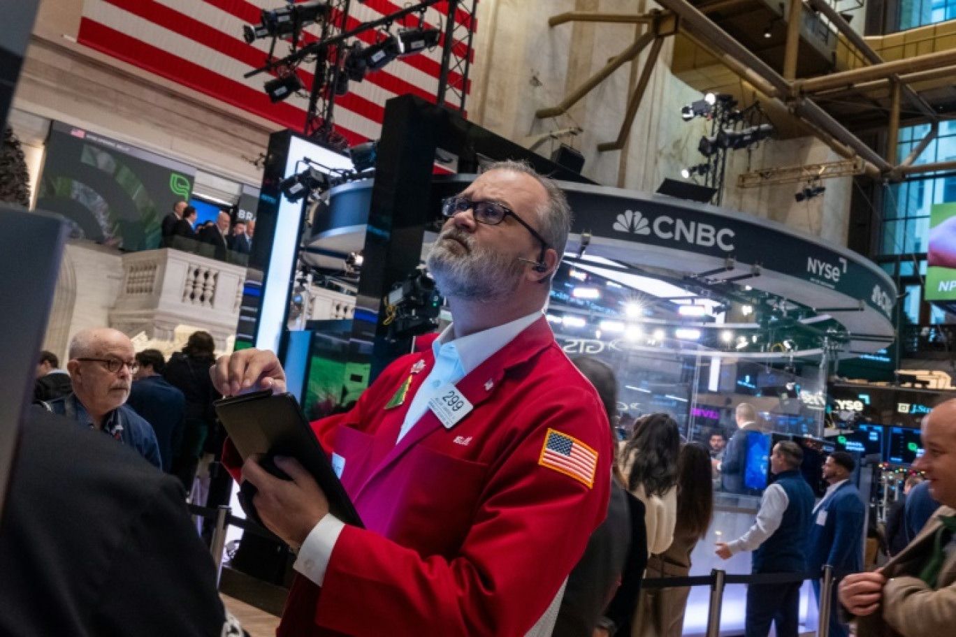 Un opérateur du New York Stock Exchange © SPENCER PLATT