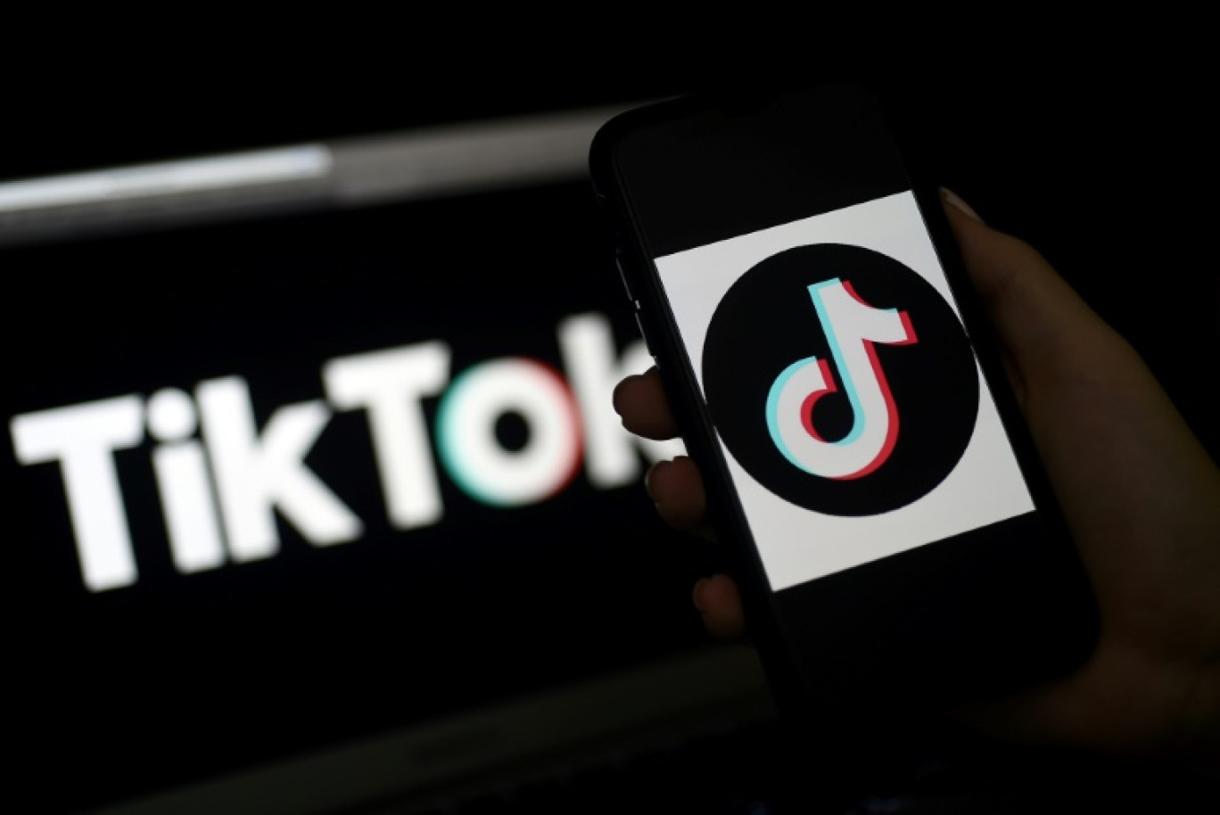 Le logo de TikTok sur l'écran d'un téléphone à Arlington, en Virginie, le 13 avril 2020 © Olivier DOULIERY