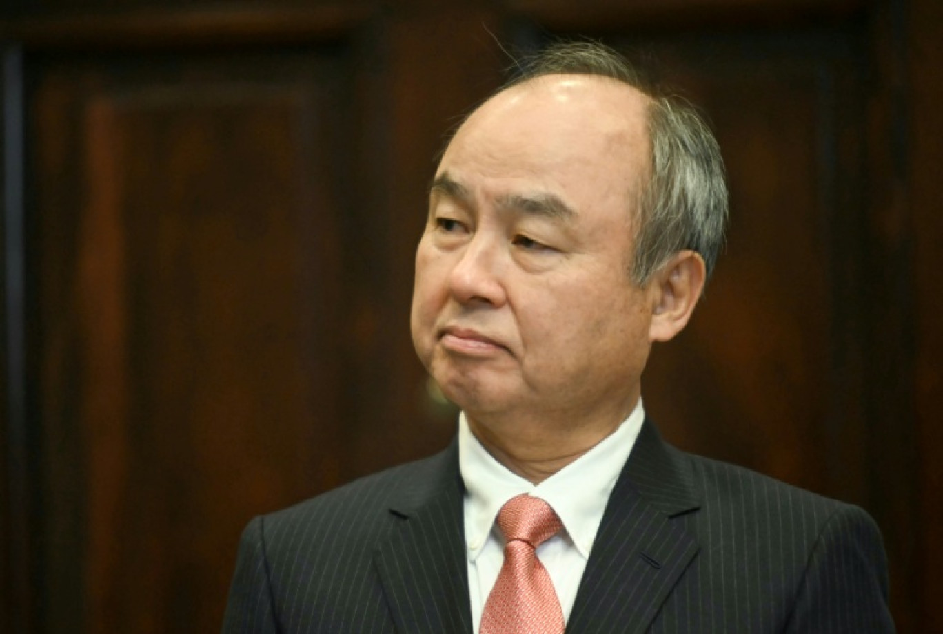 Masayoshi Son, président-directeur général de SoftBank, écoute le président américain Trump dans la salle Roosevelt de la Maison Blanche, le 21 janvier 2025 à Washington © Jim WATSON