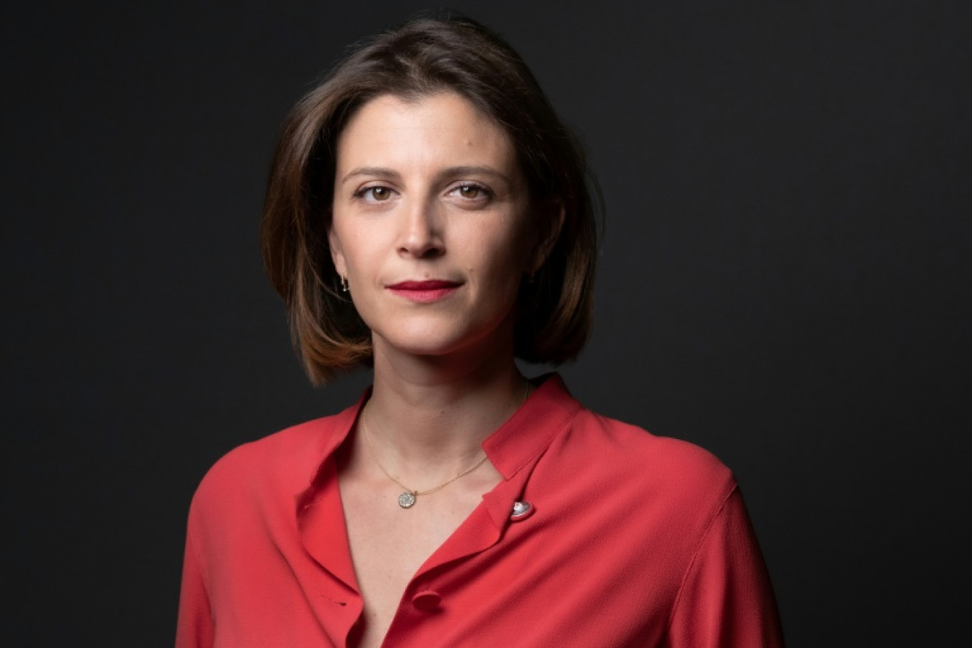 Julia Bijaoui, alors présidente de la  société de livraison rapide de repas Frichti, pose au siège de l'entreprise le 20 avril 2022 à Paris © JOEL SAGET