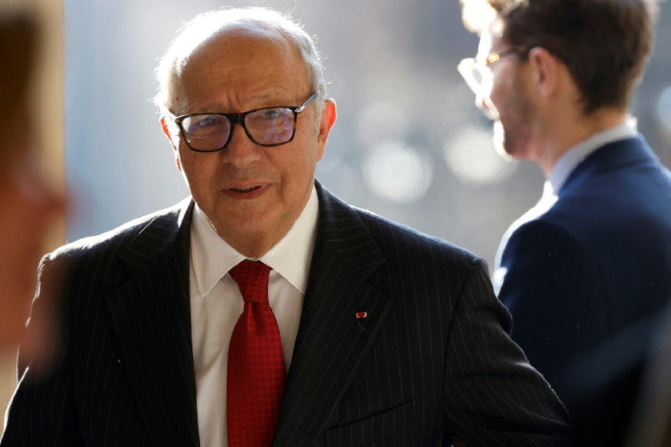 Le président du Conseil constitutionnel Laurent Fabius arrive à l'Assemblée nationale à Paris, le 14 janvier 2025 © Ludovic MARIN