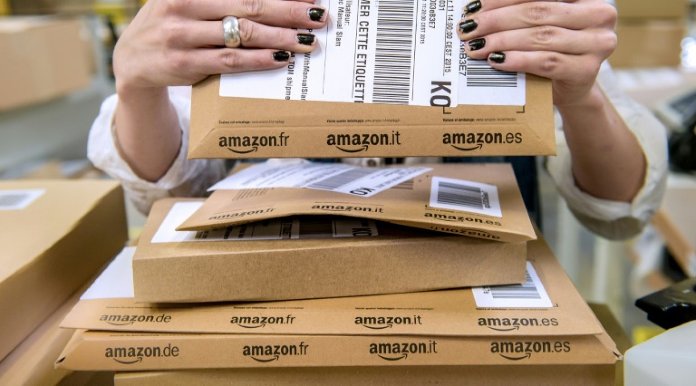 Le géant du commerce en ligne Amazon, qui conteste l'obligation légale d'expédier ses livres avec des frais de port, a remporté une manche mercredi devant le Médiateur du livre © Philippe HUGUEN