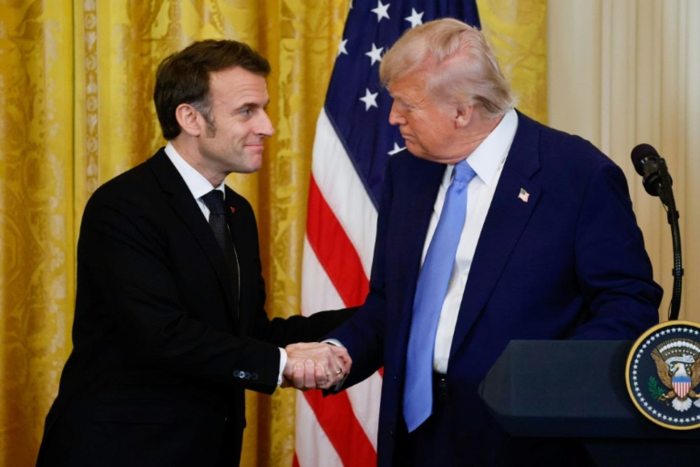 Les présidents français Emmanuel Macron et américain Donald Trump, le 24 février 2025 pendant un conférence de presse conjointe à Washington © Ludovic MARIN