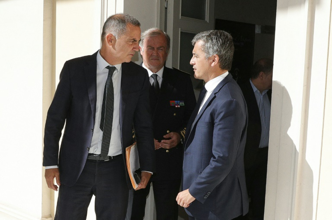 Le président autonomiste du conseil exécutif de Corse Gilles Simeoni et le ministre de la Justice Gérald Darmanin (alors à l'Intérieur), le 14 septembre 2023 à Ajaccio © PASCAL POCHARD-CASABIANCA