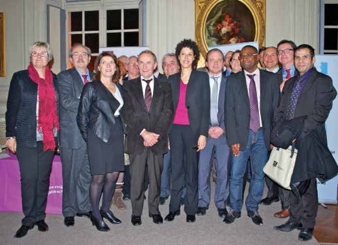 Photo de groupe avec quelques signataires de la charte.