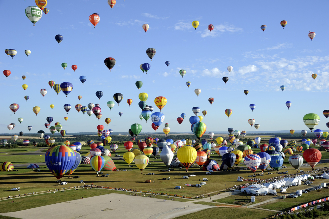 Le Grand Est Mondial Air Ballons envahit le ciel et le sol de l’aérodrome de Chambley du 26 juillet au 4 août prochain. 
Crédit photo : A. Marchi